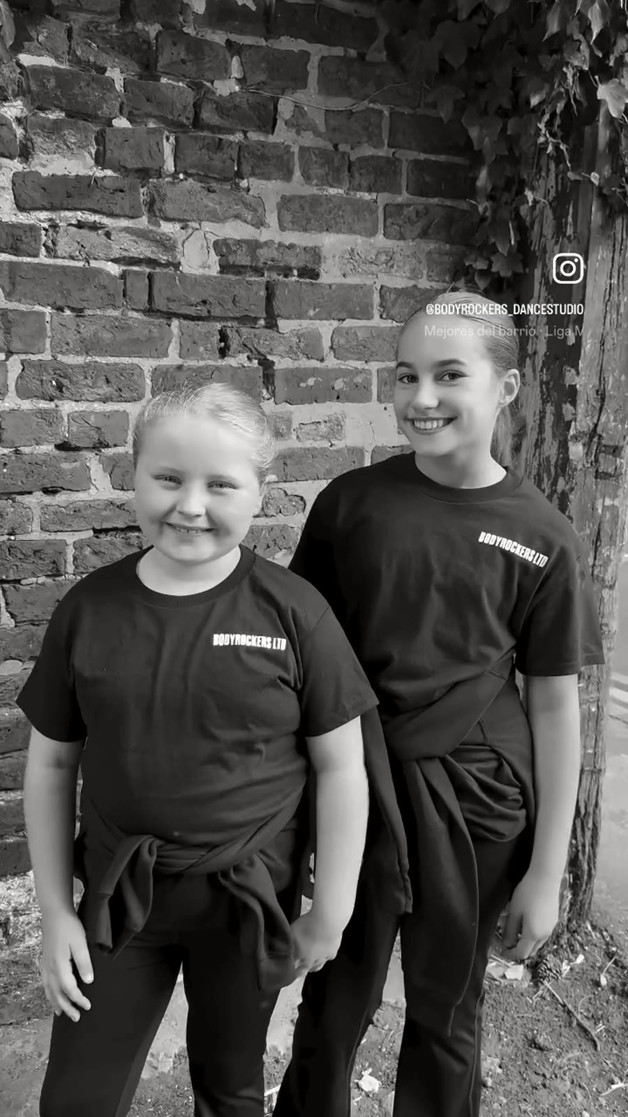 Two dancers wearing Bodyrockers tops